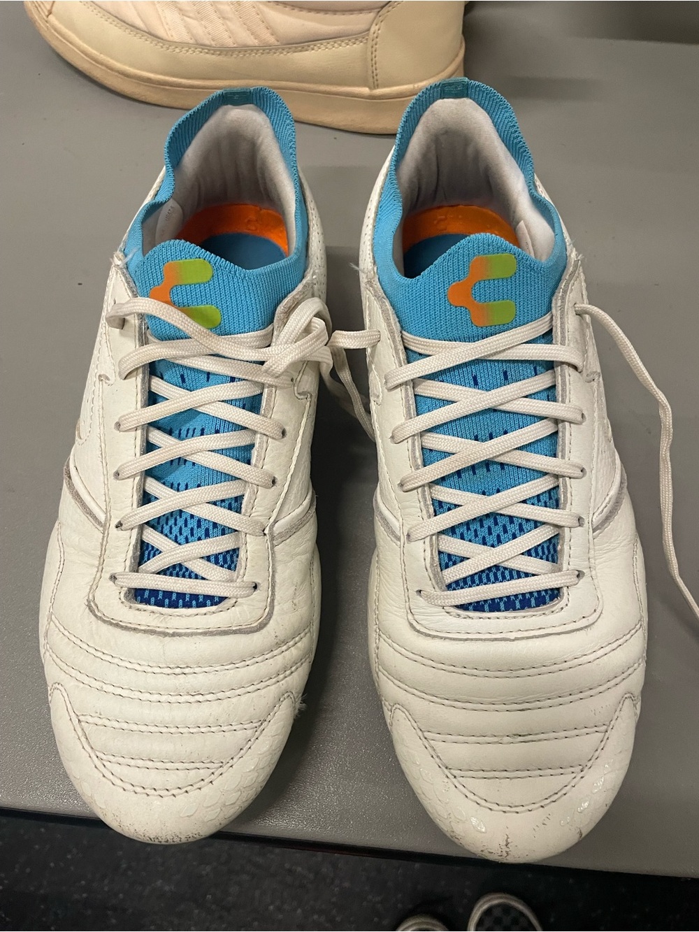 Charly White/Blue/Orange leather soccer cleats. MG (Multi ground)
